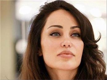 رامانا سیاحی؛ بدل آنجلینا جولی در حال موتور سواری در خیابان‌های تهران + فیلم